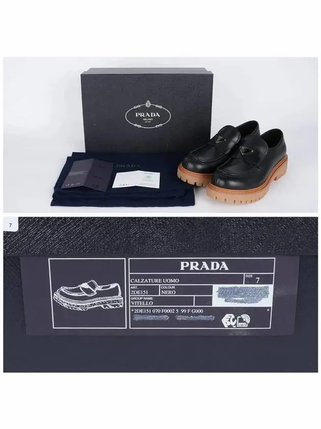 2DE151 070 F0002 Triangle logo leather loafers